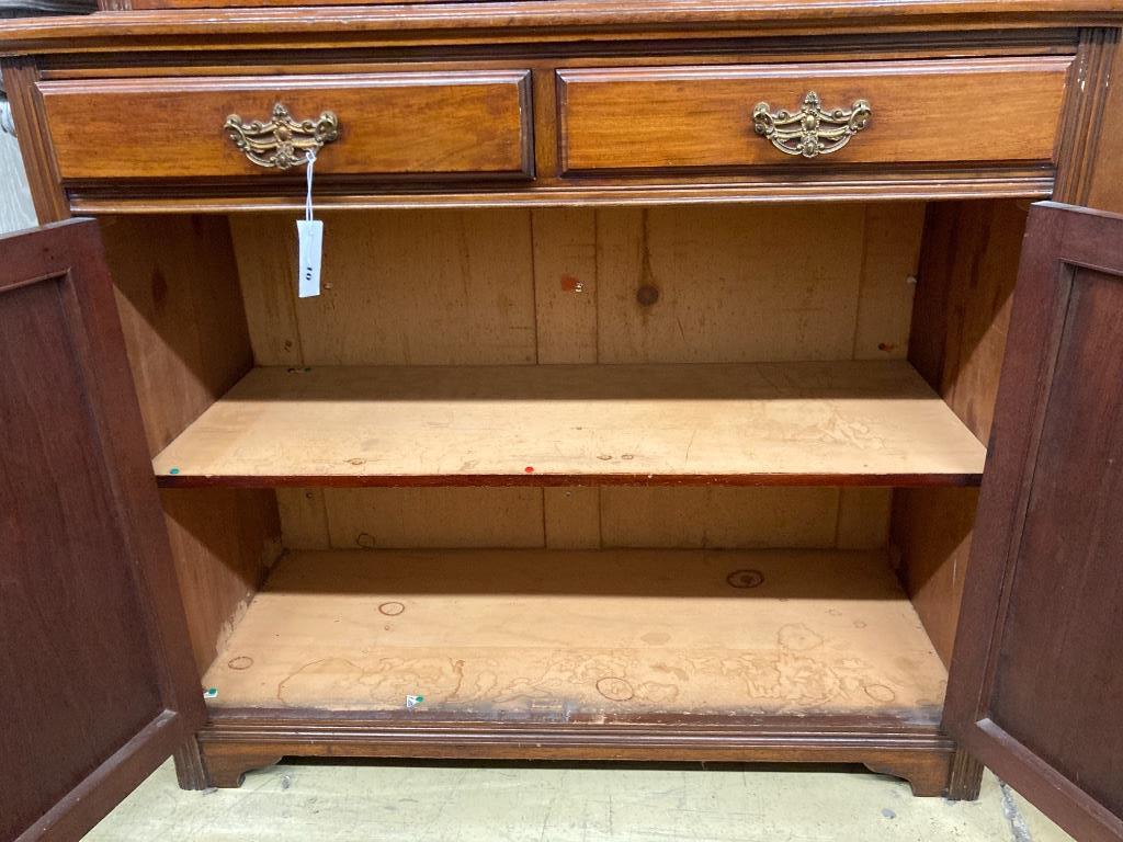 A Victorian mahogany bookcase cupboard, length 106cm, depth 47cm, height 222cm